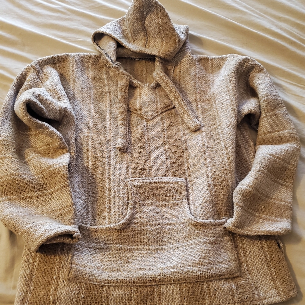 Tan knit poncho (aka drug rug)